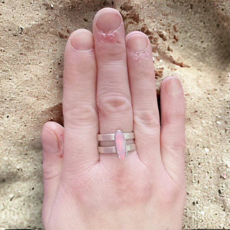 Opal Doublet and Sterling Silver Ring with stone texture showing the reds